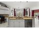 Kitchen island featuring granite countertops, stainless steel appliances, and recessed lighting at 14378 Stamford Cir, Orlando, FL 32826