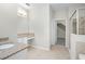 This bathroom is complete with a granite counter and a glass enclosed shower at 1540 Softshell St, St Cloud, FL 34771