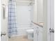 Cozy bathroom with a combined shower and tub, and bright lighting at 1540 Softshell St, St Cloud, FL 34771