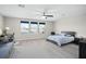 Spacious bedroom provides versatile living with ample space for both a bed and desk at 1540 Softshell St, St Cloud, FL 34771