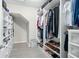 This walk-in closet features built-in shelving to keep your wardrobe organized at 1540 Softshell St, St Cloud, FL 34771