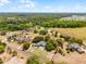 Beautiful home surrounded by lush greenery, offering privacy and tranquility in a picturesque, expansive landscape at 1689 Saboff Way, Chuluota, FL 32766