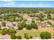 Charming home set in a wooded landscape, offering privacy and tranquility with a spacious yard and surrounding greenery at 1689 Saboff Way, Chuluota, FL 32766