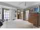 Comfortable bedroom offers lots of natural light and includes closet access and ensuite bathroom at 1689 Saboff Way, Chuluota, FL 32766
