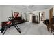 Sun-filled bedroom boasts ample space, a ceiling fan, and convenient en-suite bathroom at 1689 Saboff Way, Chuluota, FL 32766
