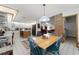 Cozy dining area with views into the living room and kitchen at 1689 Saboff Way, Chuluota, FL 32766