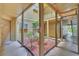 A quaint condominium courtyard with greenery, offering a tranquil outdoor space at 1908 Lake Atriums Cir # 3, Orlando, FL 32839