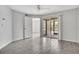 Bright room with a ceiling fan and sliding glass doors to an outdoor space at 1908 Lake Atriums Cir # 3, Orlando, FL 32839