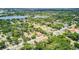 Scenic aerial view of a neighborhood featuring lush greenery, residential streets, and homes at 2114 Gerda Ter, Orlando, FL 32804