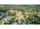 A lovely, verdant neighborhood with a variety of home styles, showcasing the community's charm and well-maintained streets at 2114 Gerda Ter, Orlando, FL 32804
