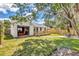 Nice backyard with a spacious lawn, deck, and room for outdoor activities and relaxation at 2114 Gerda Ter, Orlando, FL 32804
