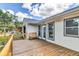 Cozy backyard deck with seating, ideal for relaxing and enjoying the outdoors at 2114 Gerda Ter, Orlando, FL 32804