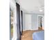 Light filled bedroom with window view and door to hallway at 2114 Gerda Ter, Orlando, FL 32804