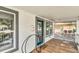 A welcoming front porch with a cozy welcome mat and stylish details enhance the home's inviting curb appeal at 2114 Gerda Ter, Orlando, FL 32804