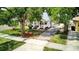 Charming single-Gathering home featuring a brick driveway, green lawn and mature trees at 2114 Gerda Ter, Orlando, FL 32804