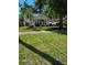 Charming one-story home featuring a manicured lawn, well-kept landscaping, and welcoming front porch at 2114 Gerda Ter, Orlando, FL 32804
