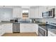 Well-equipped kitchen with stainless steel appliances and ample counter space at 2114 Gerda Ter, Orlando, FL 32804