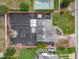 Aerial view showcases the large backyard, pool, and patio area of the property at 2121 Vivada St, Orlando, FL 32803