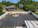 Aerial view showcasing the spacious backyard, complete with a fence, pool, and outdoor lounging area at 2121 Vivada St, Orlando, FL 32803