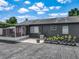 Spacious backyard featuring a screened patio area with a garden, great for outdoor living and enjoyment at 2121 Vivada St, Orlando, FL 32803