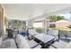 The backyard features a covered patio and a separate garage, offering ample space for relaxation and storage at 2314 Falkner Rd, Orlando, FL 32810