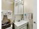 Bathroom featuring a white vanity and a mirrored medicine cabinet at 2314 Falkner Rd, Orlando, FL 32810
