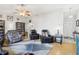 Bright and open living room with neutral walls, lots of seating, and ample natural light at 2314 Falkner Rd, Orlando, FL 32810