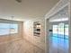 Dining room featuring tile floors and a stone accent wall at 2648 Needlepoint St, Kissimmee, FL 34741