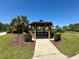 Community gazebo with well-maintained landscaping, offering a tranquil spot to relax and socialize at 2648 Needlepoint St, Kissimmee, FL 34741