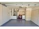 This is a garage with a washer and dryer, water heater, HVAC system, and storage at 266 Paradise Woods Ct, Davenport, FL 33896