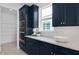 Close-up of kitchen showcasing custom cabinets, stainless steel appliances, and elegant countertop at 2725 Serenity Meadow Dr, Kissimmee, FL 34744