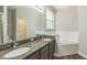 Primary bathroom featuring a granite vanity and tub at 2765 Eldred Ct, Apopka, FL 32712