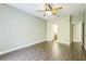 Bedroom featuring wood-look floors and neutral paint at 2765 Eldred Ct, Apopka, FL 32712