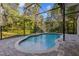 An enticing screened-in pool and patio provide a private escape for relaxation and outdoor enjoyment in this backyard at 2765 Eldred Ct, Apopka, FL 32712