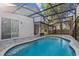 Enjoy the outdoors in this screened-in pool and brick patio, ideal for relaxing and entertaining friends and Gathering at 2765 Eldred Ct, Apopka, FL 32712
