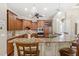 Beautiful kitchen featuring custom cabinets, granite countertops, and stainless steel appliances at 2825 Lakeshore Dr, Mount Dora, FL 32757