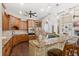 Gourmet kitchen with custom cabinetry, granite countertops, and stainless steel appliances at 2825 Lakeshore Dr, Mount Dora, FL 32757
