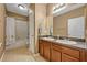 Bright bathroom featuring a double sink vanity and a shower-tub combination at 2860 Falconhill Dr, Apopka, FL 32712