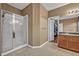 Bathroom featuring a glass enclosed shower and vanity with sink at 2860 Falconhill Dr, Apopka, FL 32712