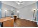 Office space with a desk, office chair, and natural lighting at 2860 Falconhill Dr, Apopka, FL 32712