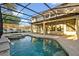 Sparkling pool and spa in a screened lanai, perfect for outdoor relaxation at 2860 Falconhill Dr, Apopka, FL 32712