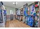 Spacious walk-in closet with custom shelving and ample storage space at 2860 Falconhill Dr, Apopka, FL 32712