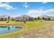 Beautiful backyard with a pond is perfect for relaxation and outdoor activities at 3295 Bailey Ann Dr, Ormond Beach, FL 32174