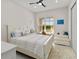 Cozy bedroom featuring a comfortable bed, ample natural light, and tasteful decor for a relaxing atmosphere at 3295 Bailey Ann Dr, Ormond Beach, FL 32174