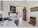 Living room features tile flooring, white trim, and decorative architectural features at 3295 Bailey Ann Dr, Ormond Beach, FL 32174