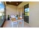 Screened patio with a dining table and seating, perfect for outdoor relaxation at 3295 Bailey Ann Dr, Ormond Beach, FL 32174