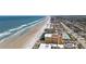 Gorgeous aerial view of the condo complex right on the beach, with stunning coastline views at 3799 S Atlantic Ave # 1006, Daytona Beach, FL 32118