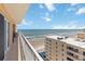 Enjoy the ocean view from the balcony, which overlooks the beach and community pool at 3799 S Atlantic Ave # 1006, Daytona Beach, FL 32118