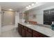 Bathroom featuring shower/tub and granite counter at 3799 S Atlantic Ave # 1006, Daytona Beach, FL 32118
