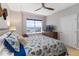 Bright bedroom with a bed and a view at 3799 S Atlantic Ave # 1006, Daytona Beach, FL 32118